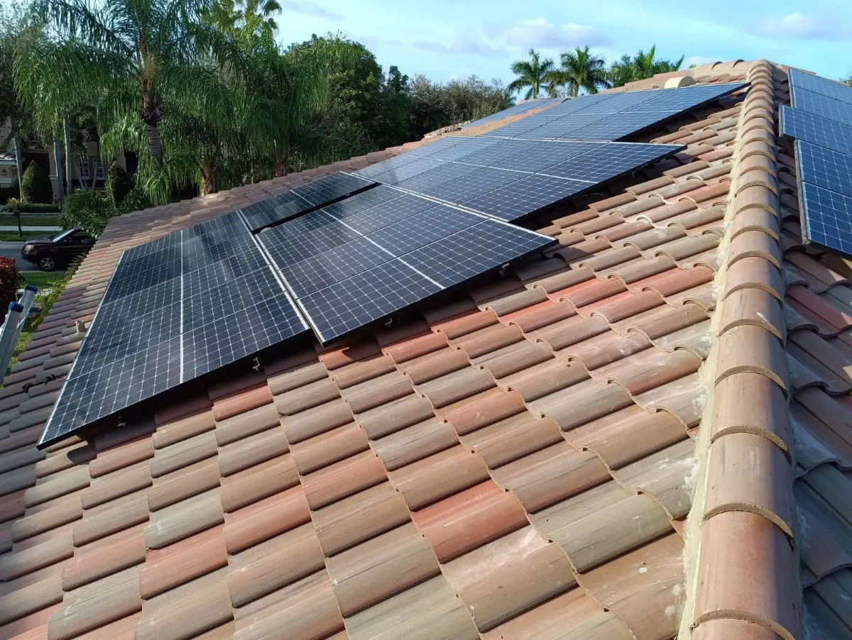 Drone view of a solar array on a barrel tile roof